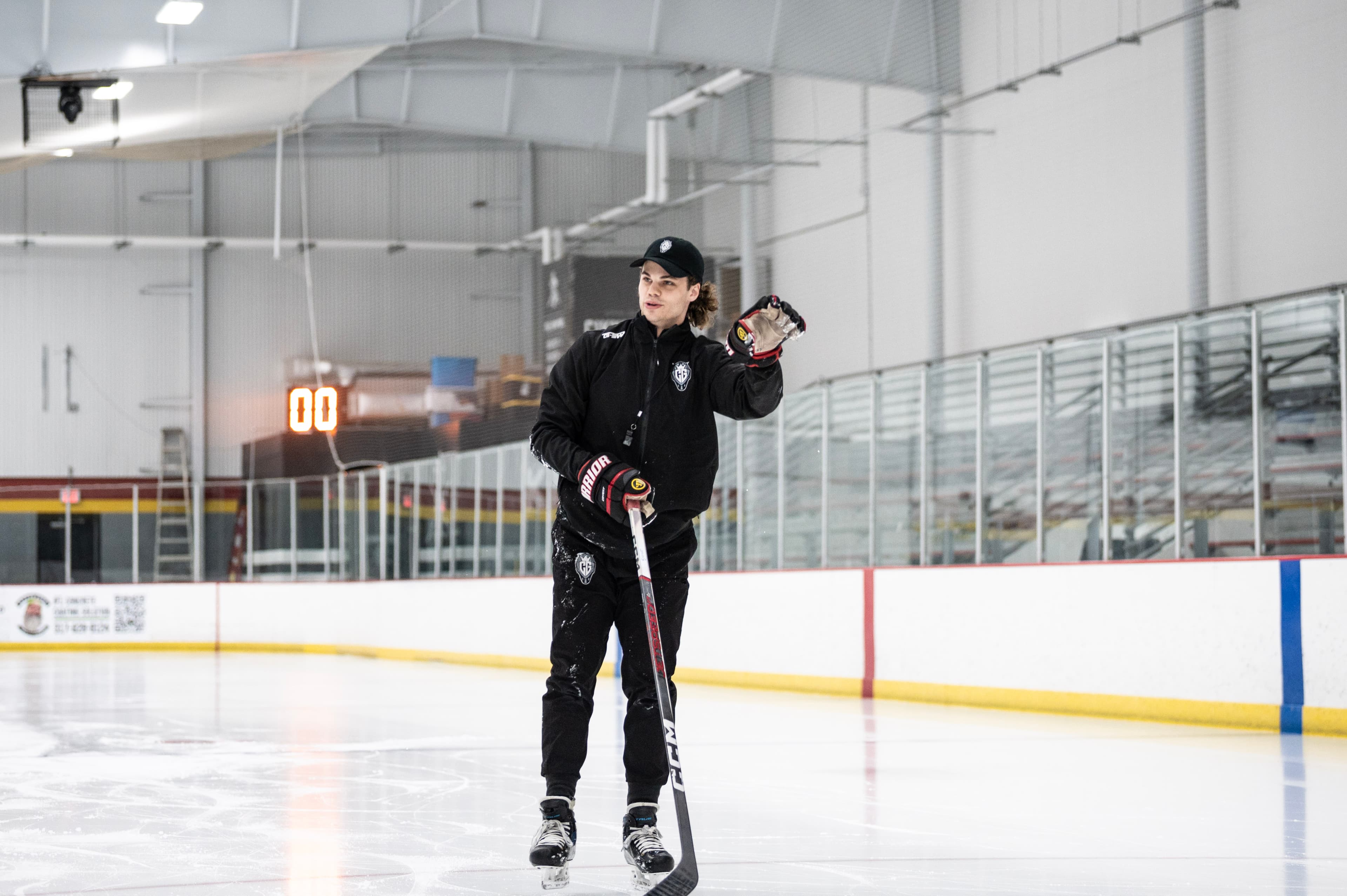 Cam Gray alone on the ice, stick in hand