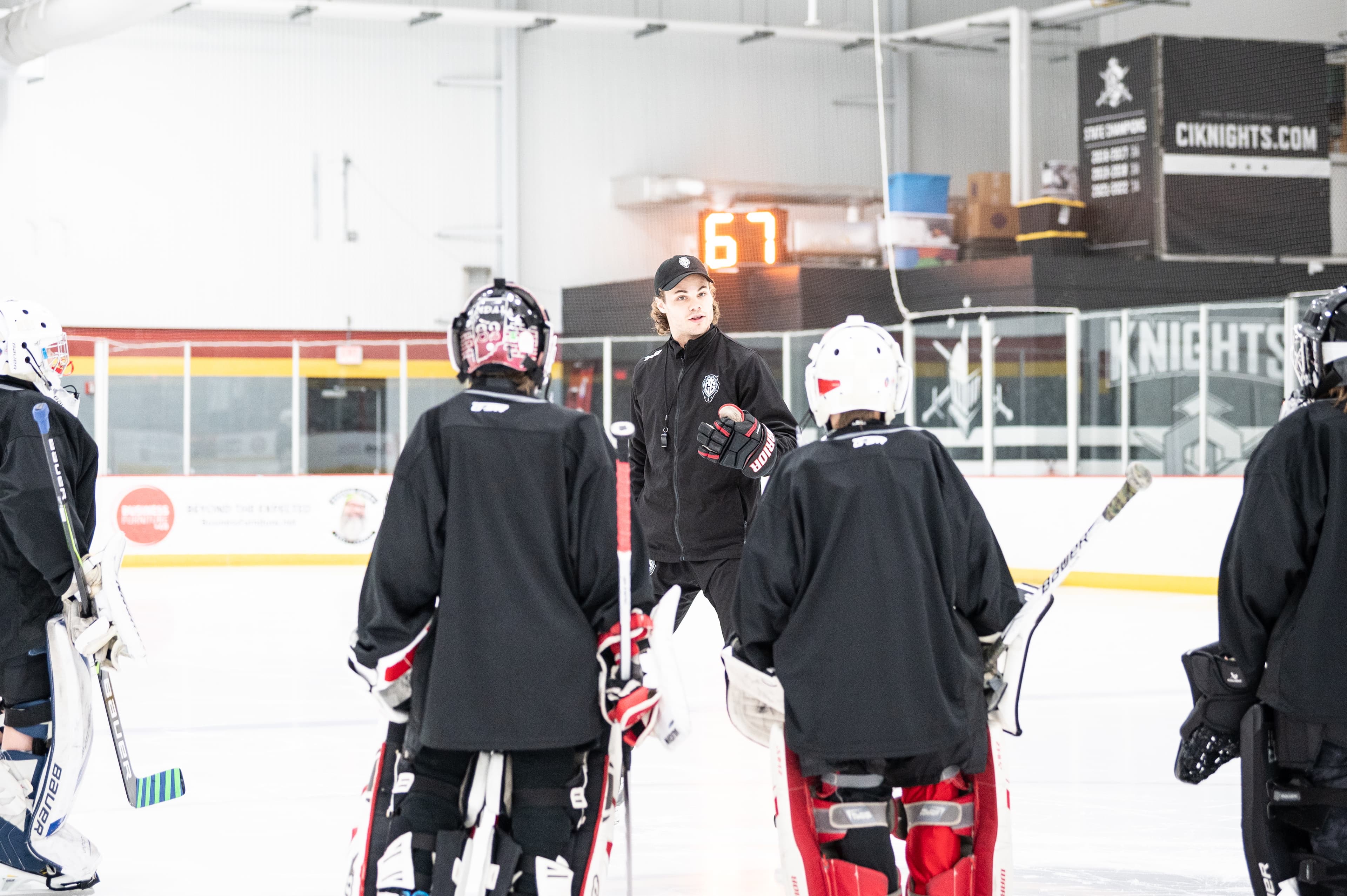 Cam Gray coaching goalies on the ice
