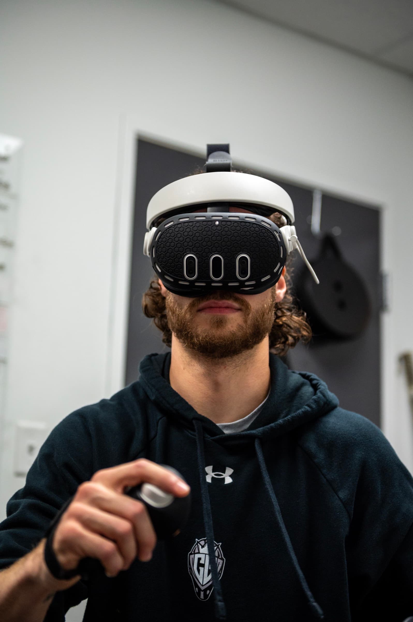 Cam Gray training reaction and tracking in a VR headset at AESV